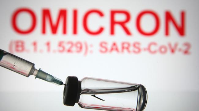 Vaccine Syringe, Omicron lettering in the background (Source: viewimage/shutterstock.com) Vaccine Syringe, Omicron lettering in the background (Source: viewimage/shutterstock.com)