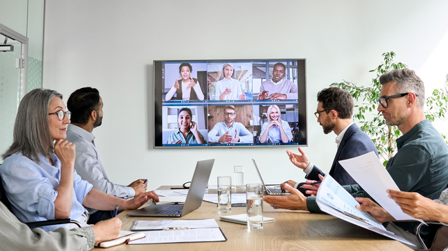 Persons in a meeting (Source: GroundPictures/Shutterstock.com)