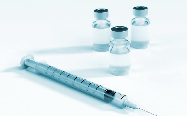 Vaccine ampoules and syringe Vaccine ampoules and syringe
